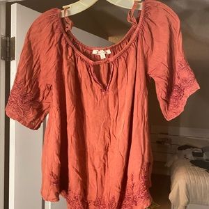 Flowy distressed top